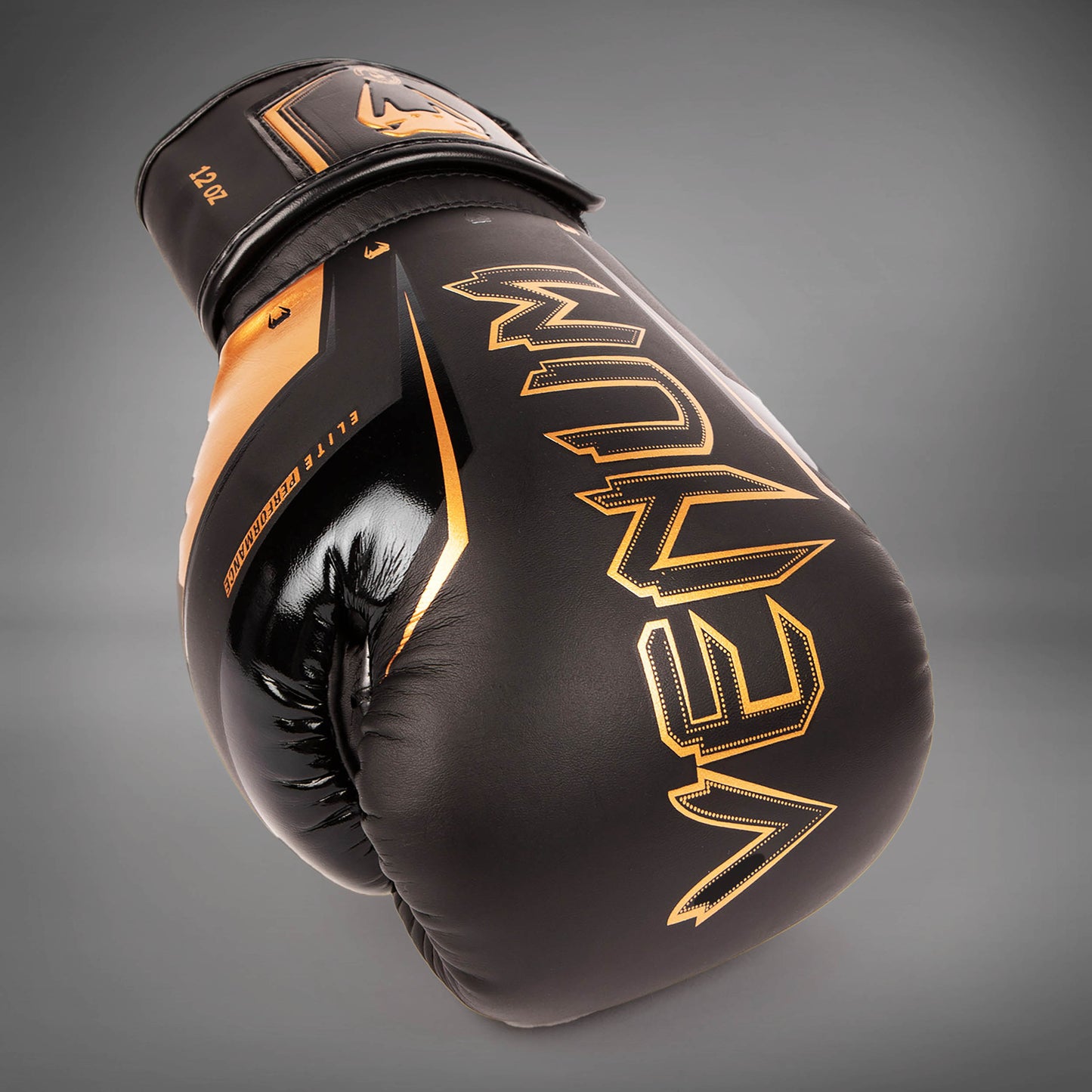 Venum Elite Evo 拳击手套 – 黑色/青铜色