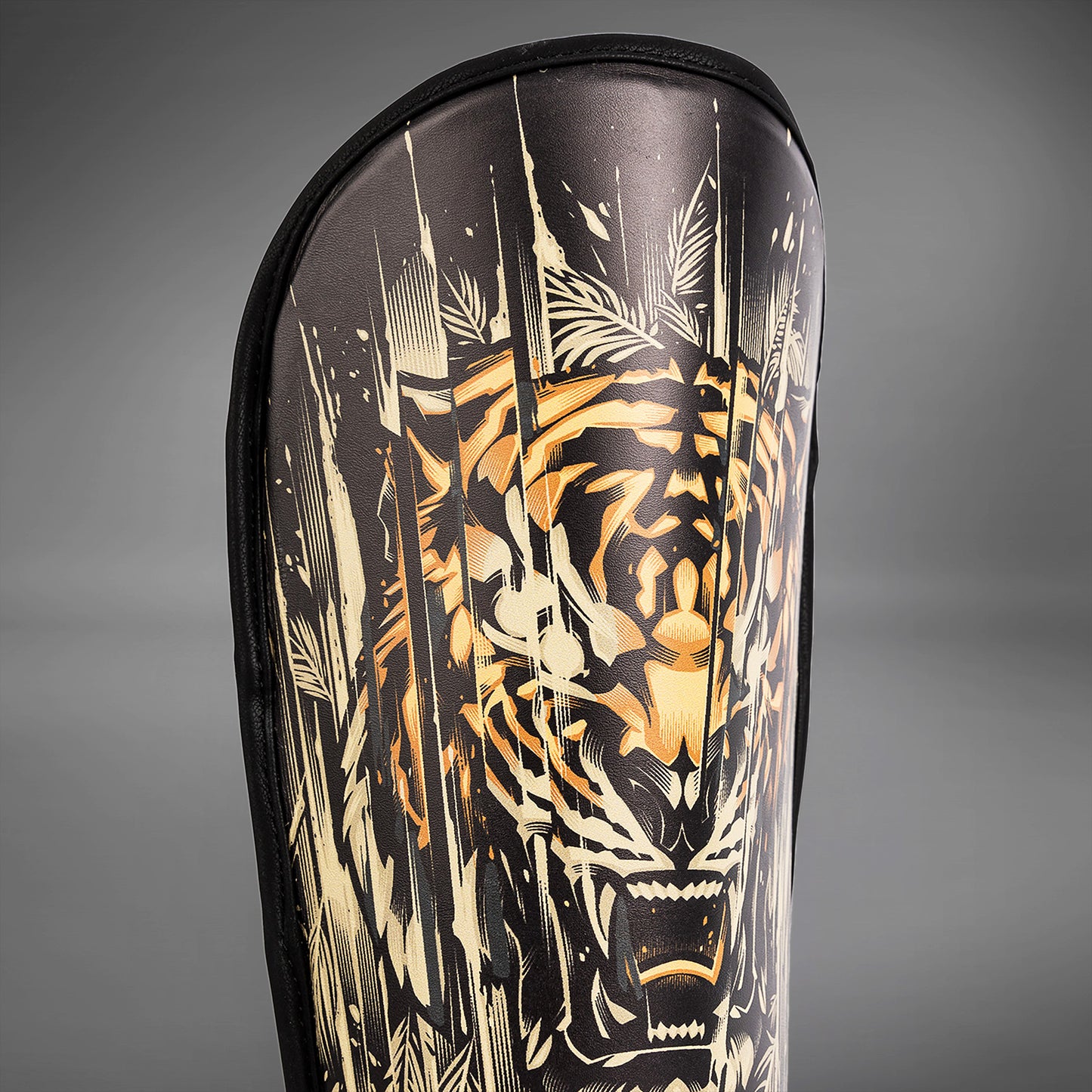 Venum Tiger 儿童护胫 – 黑色/荧光橙色