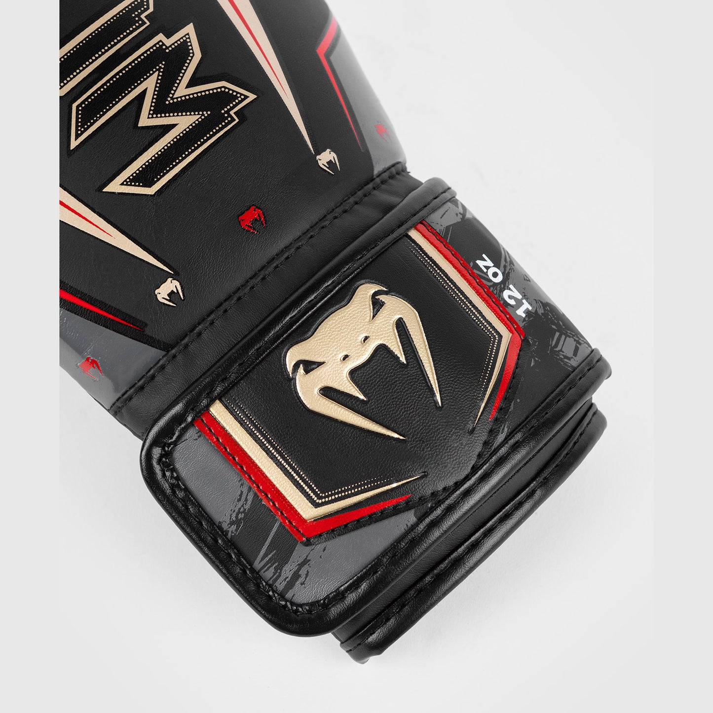 Venum Elite Evo 拳击手套 – 黑色/金色/红色