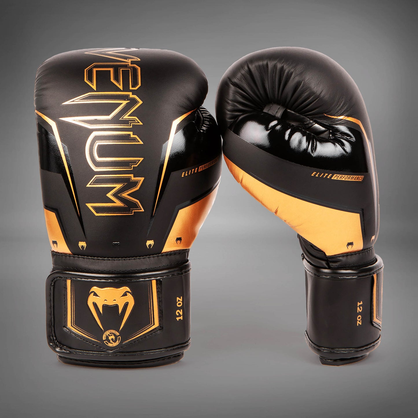 Venum Elite Evo 拳击手套 – 黑色/青铜色