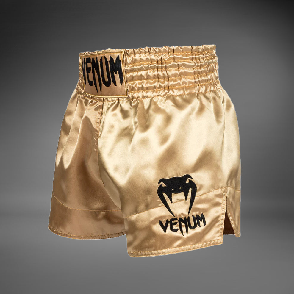 Venum Classic 泰拳短裤 – 金色/黑色