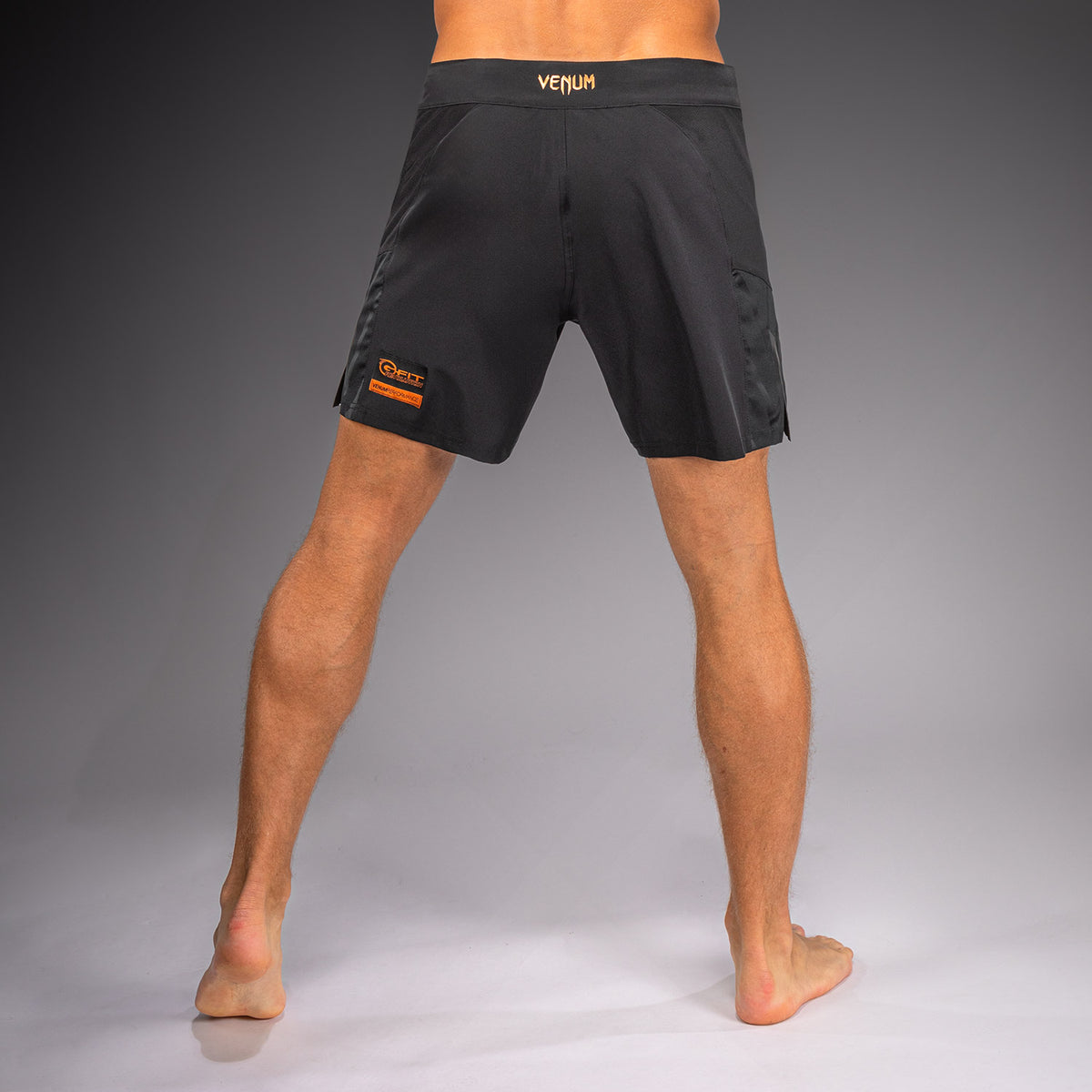 Venum G-Fit Revolution 格斗短裤 - 黑色/铜色